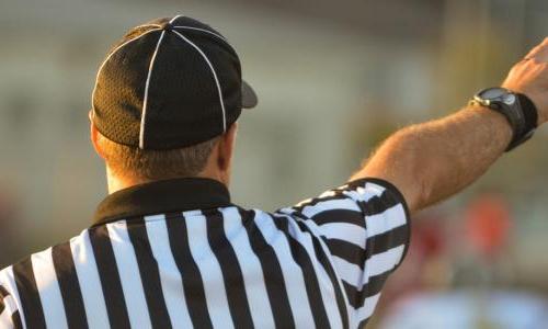 A referee pointing.